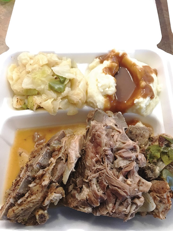 Slow-cooked neck bones with cabbage and mashed potatoes with gravy - JACOB THREADGILL