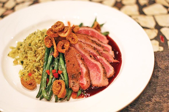 The seared duck breast is co-owner Lesley Rawlinson’s favorite dish on the menu. - PASEO GRILL / PROVIDED