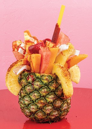 A piña loca covered in lime juice and chamoy seasoning - SYN3RGY GREATIVE GROUP / PROVIDED