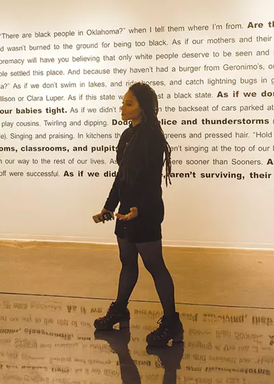 Tatyana Fazlalizadeh, a visual artist native to Oklahoma, has heard and encountered countless instances of blatant and subtle racism. - ALEXA ACE