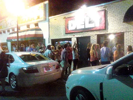 A crowd waits in line for a weekend show at The Deli. - PROVIDED