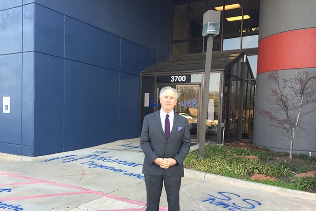Former Gov. David Walters stands in front of the Oklahoma Democratic Party headquarters, which was hit with racist graffiti on Thursday. - GEORGE LANG