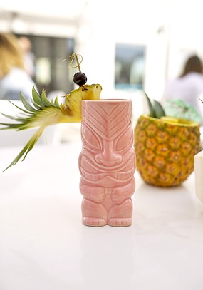 OSO’s tiki drinks are served in special tiki glasses garnished with fresh fruit. - ALEXA ACE