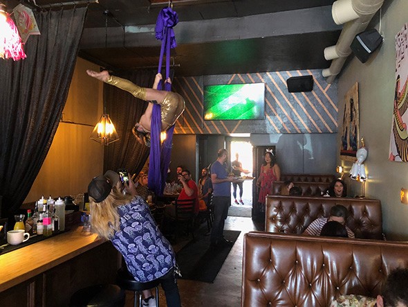 Unicorn brunch includes surprises, like aerial performer Chase Vegas. - PROVIDED