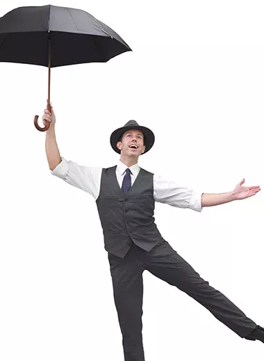 Jeremy Benton plays Don Lockwood in Lyric Theatre’s production of Singin’ in the Rain. - LYRIC THEATRE / PROVIDED