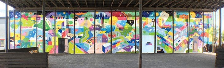 Kristopher Kanaly painted a 20-foot mural on one of the building’s walls. - PETE BRZYCKI
