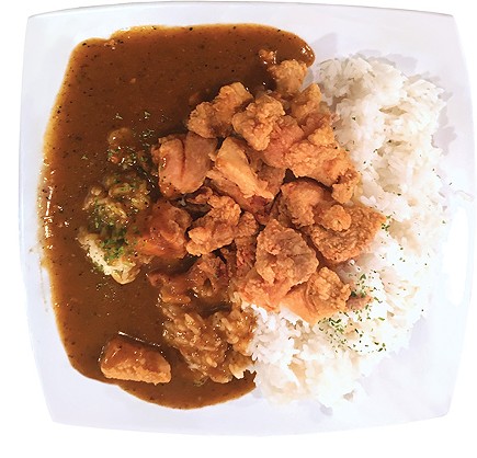 Japanese curry served with chicken karaage and white rice - JACOB THREADGILL