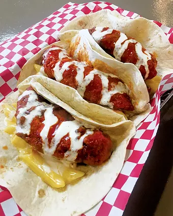 Buffalo chicken tacos with macaroni and cheese - JACOB THREADGILL