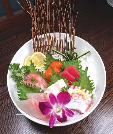 Sushi entrees at Ichiban are garnished with flowers and leaves. - PHILLIP DANNER