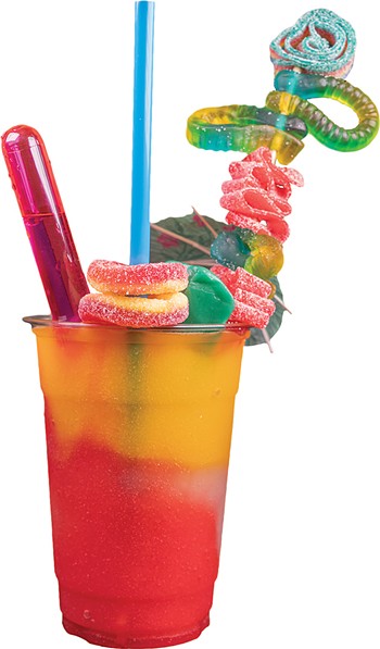 Customers can get wine-based daiquiris topped with candy at Good Times & Great Vibes. - PHILLIP DANNER