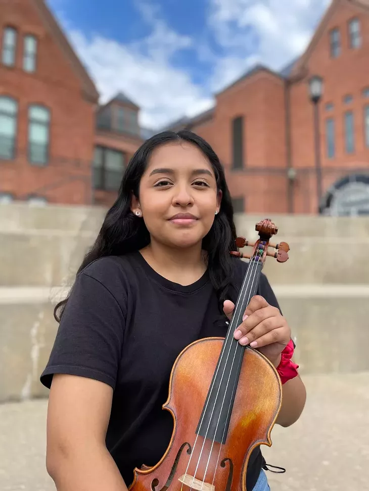 Adriana Medina with her violin at UCO - KM BRAMLETT