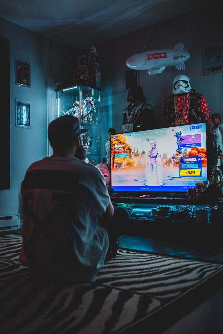 Players play Fortnite remotely during the pandemic. Fortnite allows players to play on various devices. - UNSPLASH.COM