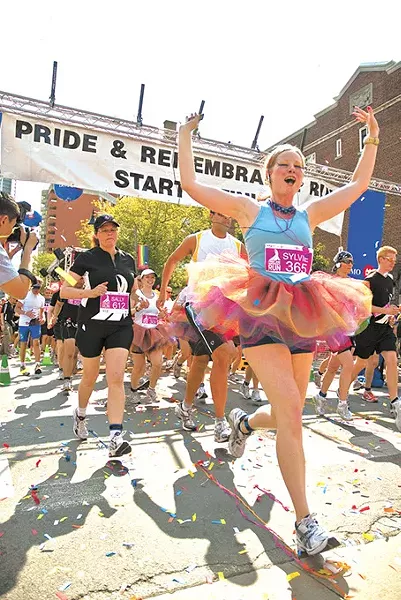 TORONTO - JUNE 27: Runners take part in the rememberance race at the Toronto Gay Pride festival on June 27, 2009 in Toronto, Canada. - BIGSTOCK
