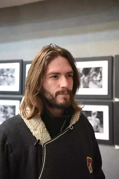 Butoh photographer David Joshua Jennings, with his exhibit at Paseo Gallery One, 1-5-15. - MARK HANCOCK