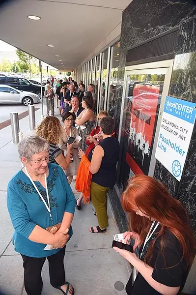 A line of people wait outside the OKCMOA to attend the screening of Rolling Papers during the DeadCenter Film Festival, 6-11-2015. Mark Hancock