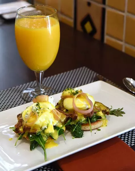 Braised short rib benedict with kale and orange juice at Park Avenue Grill in the Skirvin. mh