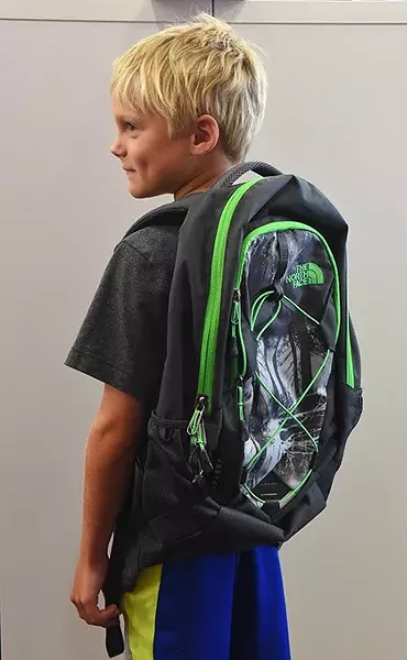 Jack Mawer models a The North Face back pack at Metro Shoe Warehouse. ( mom signed my release) mh