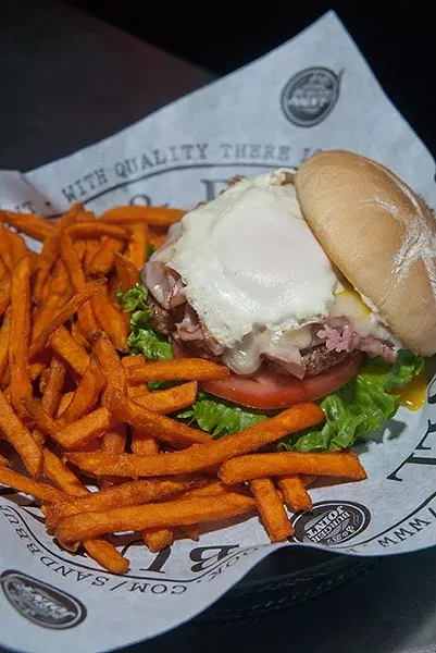 The Frankenburger with sweet potatoe fries, at S&B Burger Joint in Norman. - MARK HANCOCK FILE