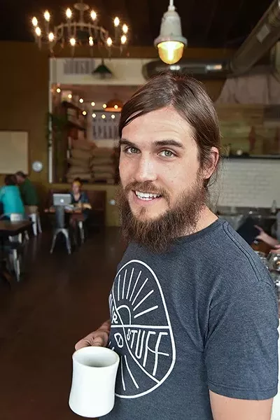 Co-owner Trey Woods at the Hoboken Coffee Roaster in Guthrie. mh