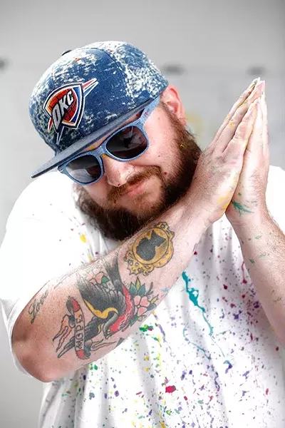 pose for a photo at Studio XII in Oklahoma City, Tuesday, May 26, 2015. - GARETT FISBECK