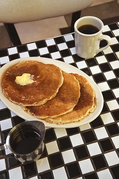 A stack of pancakes at the Hungry Frog Restaurant. mh
