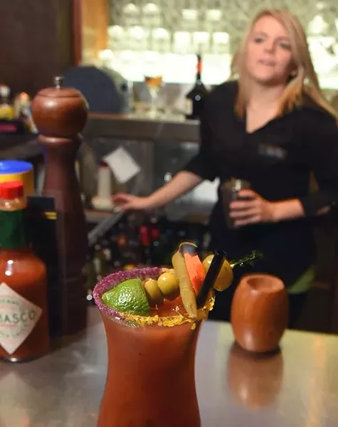 Bar tender action with a Bloody Mary at the bar at Pearls Oyster Bar on N. Classen. mh