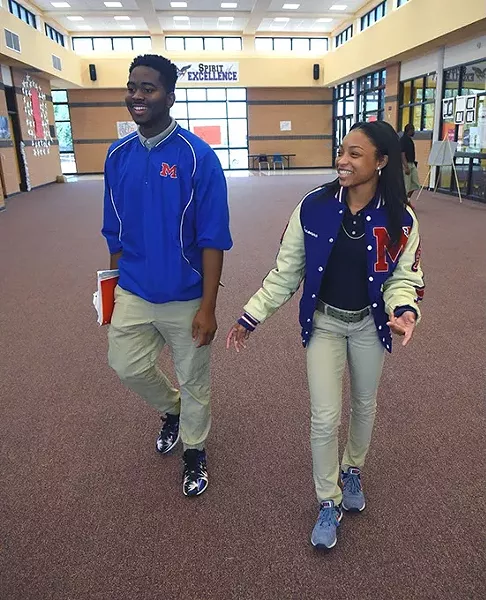 From left, Sr. Class President E.J. Green walks with full scholarship receipient, Breonna Hall, at Millwood High School, 10-5-15. - MARK HANCOCK