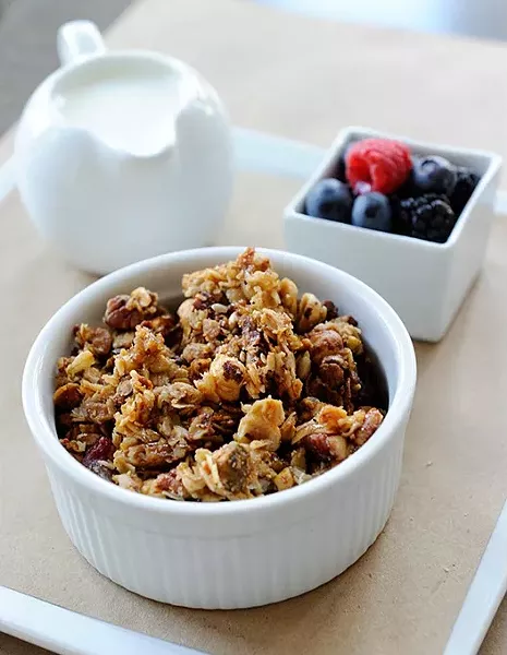 House made granola with berries and milk at Kitchen 324 in Oklahoma City, Thursday, Sept. 17, 2015. - GARETT FISBECK
