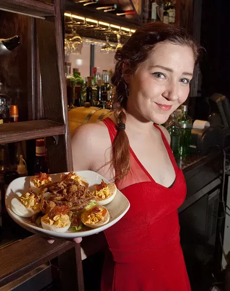 Taylor Hutchensin with Deviled Eggs at WSKY Lounge. (Mark Hancock)