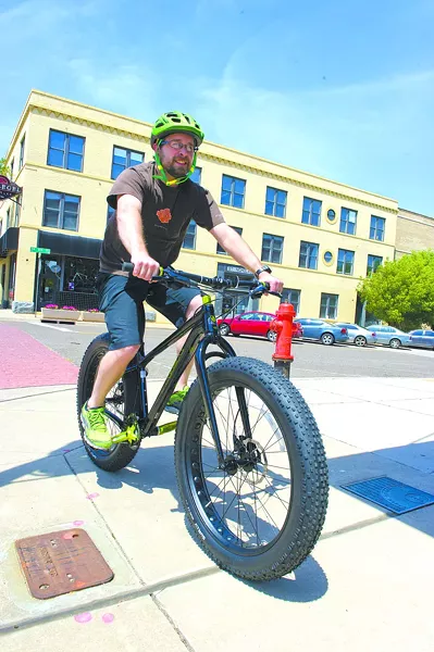 Steve Swanson outside of Schlegel Bicycles - Photo by Shannon Cornman - SHANNON CORNMAN