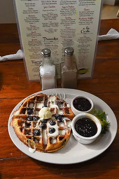 A classic blueberry waffle at The Hash Retro Diner, in Edmond, Oklahoma, USA, cha-cha-cha, 11-17-15. - MARK HANCOCK
