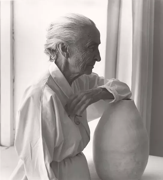 "Georgia O’Keeffe with Juan Hamilton Pot" by Laura Gilpin - IMAGE FRED JONES JR. MUSEUM OF ART / PROVIDED