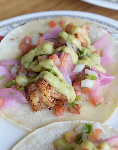 Shrimp tacos at Revolucion Taqueria and Cantina, Thursday, June 8, 2017. - GARETT FISBECK