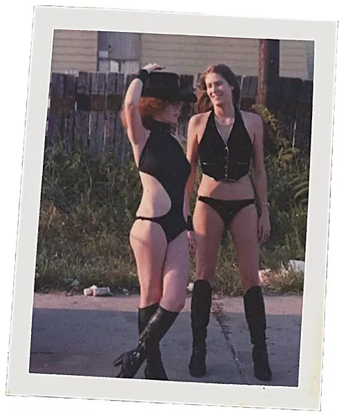 Connie, a former Red Dog dancer, talking with a coworker outside the club. (Red Dog / provided)
