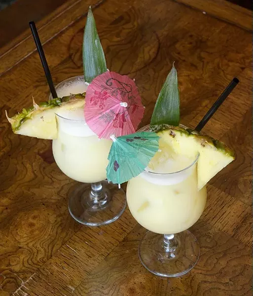 Two Piña Coladas at Rockford Cocktail Den (Garett Fisbeck)