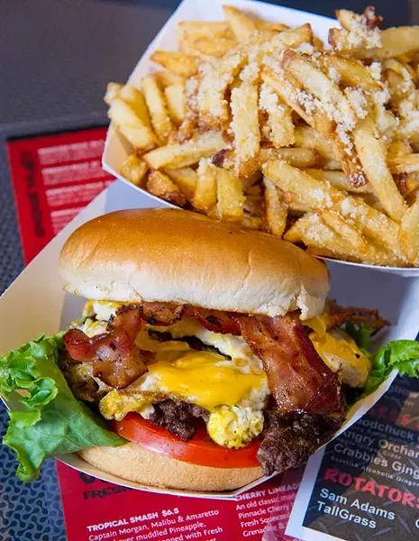 The Egg-O-Nater with bacon and a side of garlic and parmesan french fries at The Garage.Photo/Shannon Cornman - SHANNON CORNMAN
