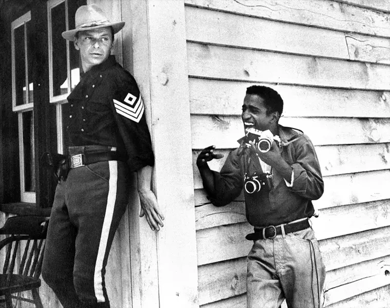 Sammy-Davis-Jr-sneaks-up-on-Frank-Sinatra-during-the-filming.jpg