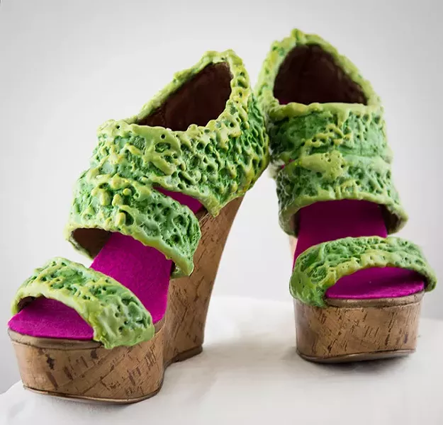 Repurposed thrift-store stilettos become part of Gayle Curry’s brightly-hued “Walking in Their Shoes” installation at Science Museum Oklahoma’s Sole Expression: The Art of the Shoe exhibit. (Photo provided)