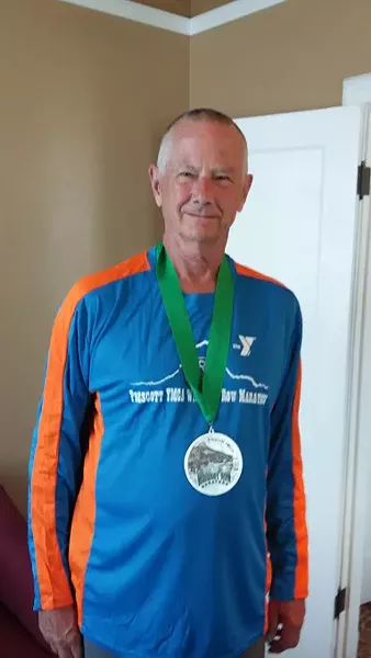 Nels Bentson after the Whiskey Row Marathon in Prescott, Arizona. Arizona is the 48th state in which he has run a marathon. | Photo provided