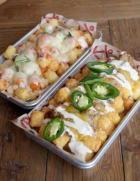Chili cheese and pizza tots at Anchor Down, Tuesday, Dec. 6, 2016. - GARETT FISBECK