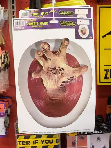 Zombie hand toilet topper at Party Galaxy. (Garett Fisbeck)