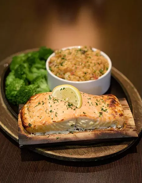 Citrus cedar plank salmon at Oliveto in Moore, Monday, March 27, 2017. - GARETT FISBECK
