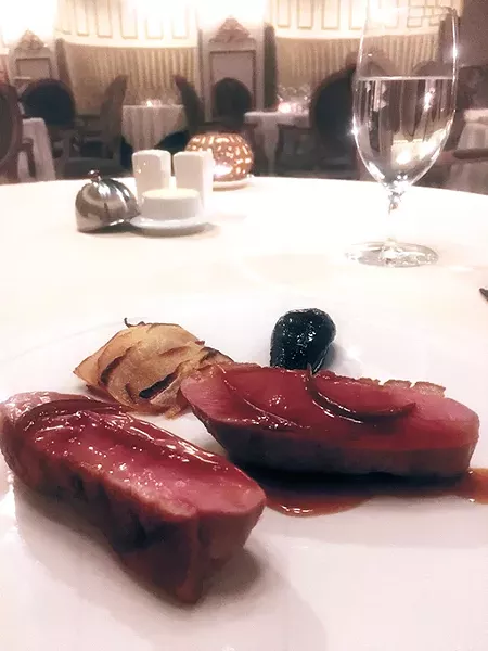 Seared duck in spiced honey - and lime sauce with red wine poached pear and turnip-celery gratin. - JACOB THREADGILL