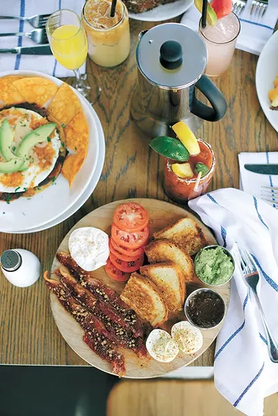 The breakfast board and huevos rancheros at Packard’s New American Kitchen - EMILY HUGH’S PHOTOGRAPHY / PROVIDED