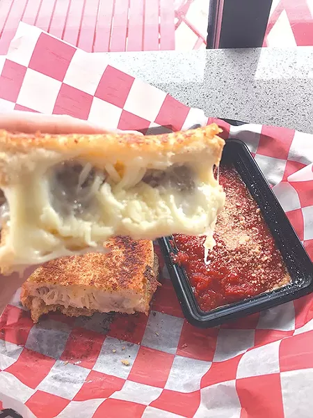 The meatball grilled cheese with a side of marinara for dipping - JACOB THREADGILL