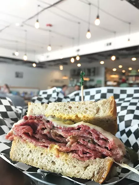 The New York, NY is the most popular sandwich at Scottie’s Deli, pairing pastrami with corned beef. - JACOB THREADGILL