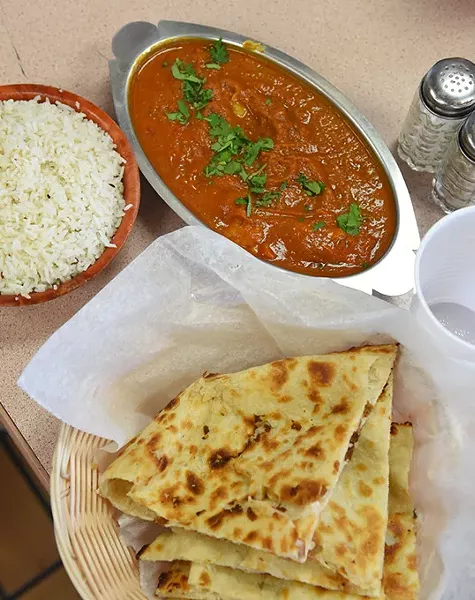 Fish curry with naan and rice. - GAZETTE/FILE
