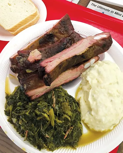 A rib dinner at George’s Happy Hog Bar-B-Q with “marvelous” mixed greens and “perfect” potato salad - JACOB THREADGILL