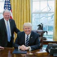 U.S. Sen. Jim Inhofe, R-Oklahoma, poses with President Donald Trump. Inhofe claims that Consumer Fraud Protection Bureau regulations are causing banking fees to rise.