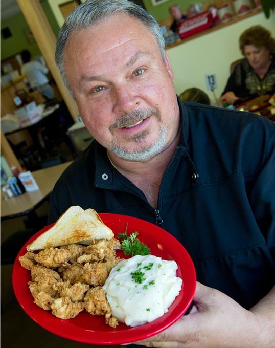 Owner of Good Gravy Ed Lechler with the fried chicken and mashed potatoes and gravy Shannon Cornman